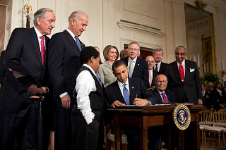 President Obama signing a Presidential Memorandum.
