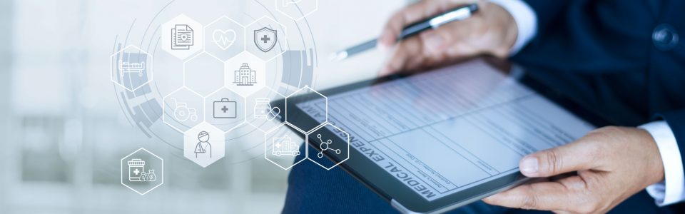 Man sitting with tablet and pen about to sign an agreement electronically