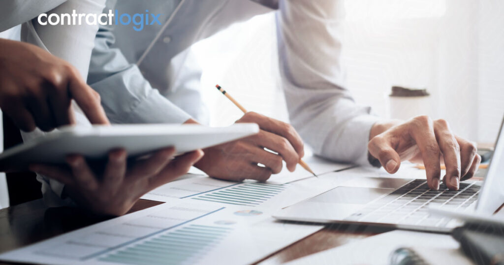 A focused investor analyzing contracts, highlighting the importance of contract analysis in business success.
