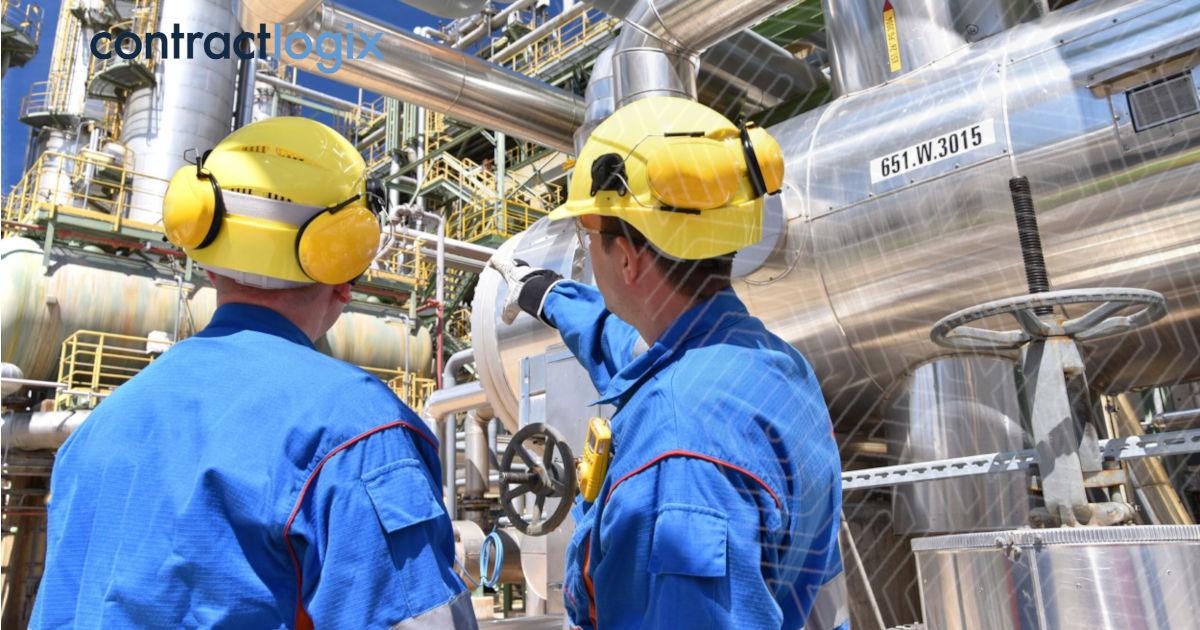 wo people inspect pipeline infrastructure while navigating energy contract lifecycle management software data in the energy industry