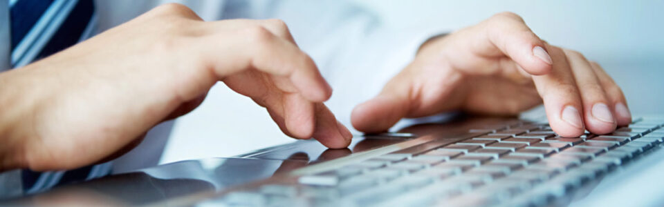 businessman typing in office to learn What is Contract Lifecycle Management and about contract lifecycle management solutions