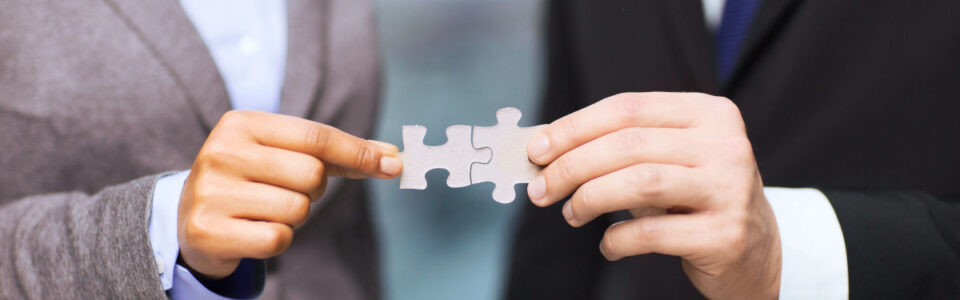 outsourced contract management partners put puzzle pieces together