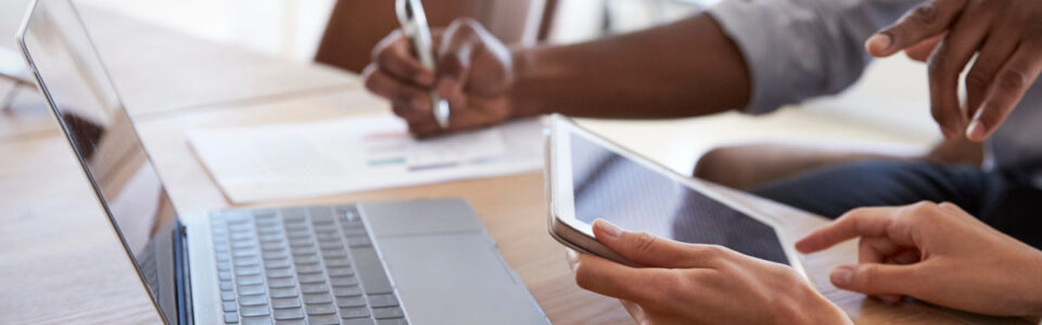 two business people researching contract management support services