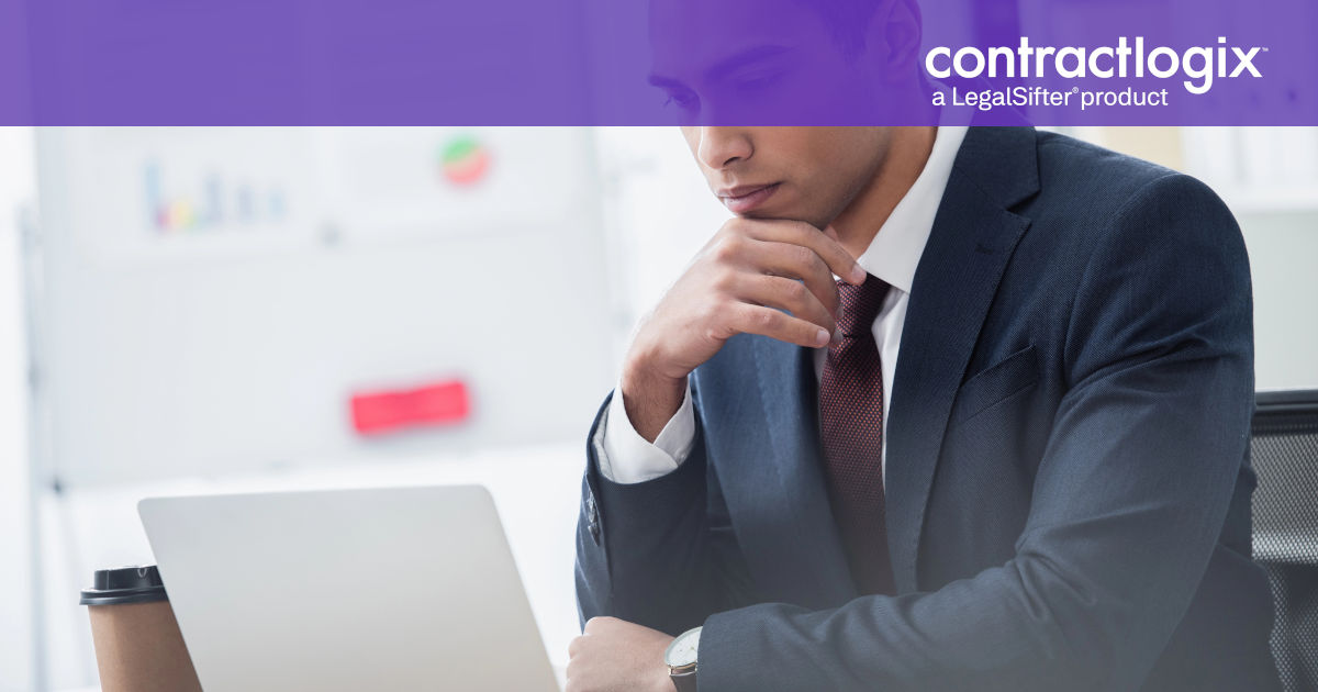 Business professional in a suit researching contract management consultants for digital contract solutions