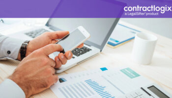 business man at desk using technology to calculate contract management OKRs